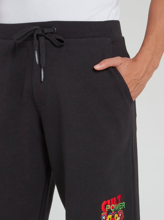 Черные шорты со шнурком и вышивкой "Розовая пантера"