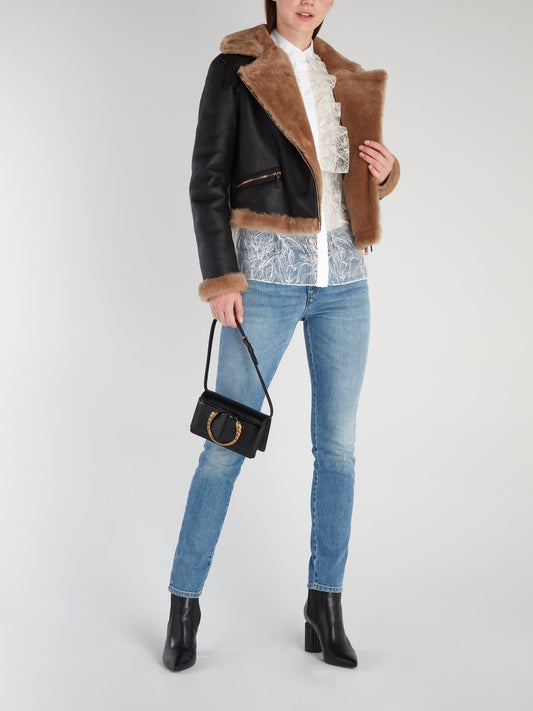 Черная кожаная куртка с меховой окантовкой