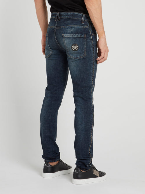 Темно-синие джинсы со стразами