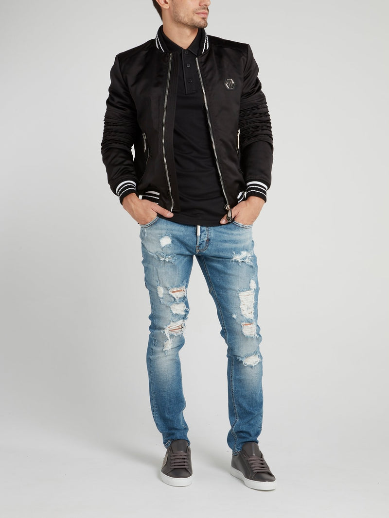 Синие джинсы с рваной отделкой