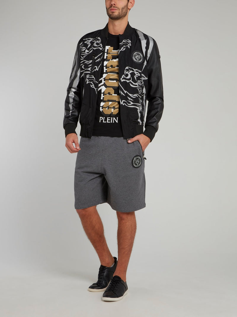 Черная куртка из нейлона и изображением тигра