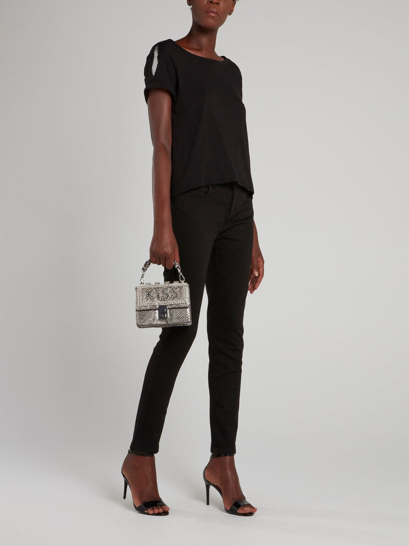 Черные брюки с декором на карманах