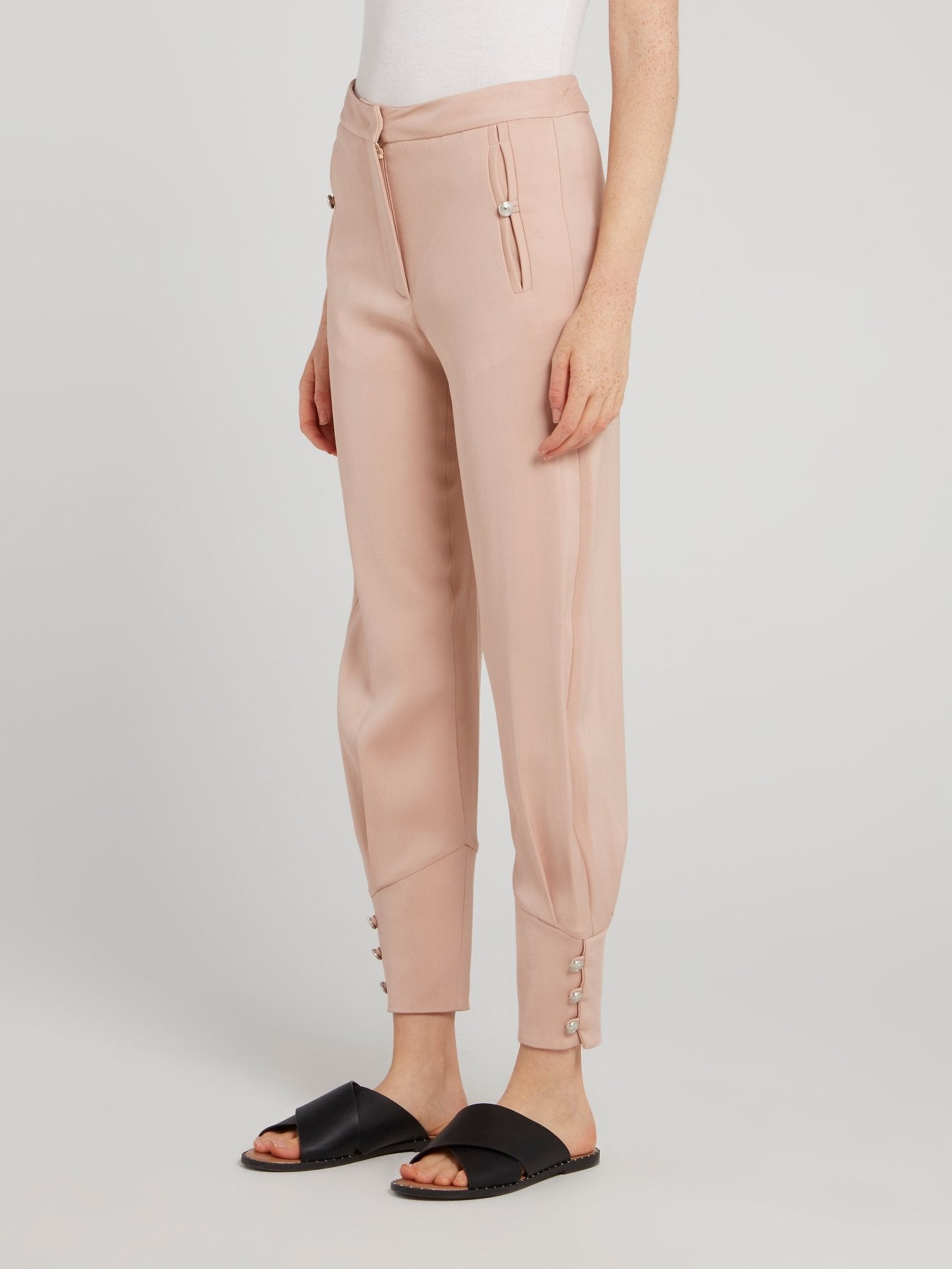 Бежевые зауженные брюки с манжетами