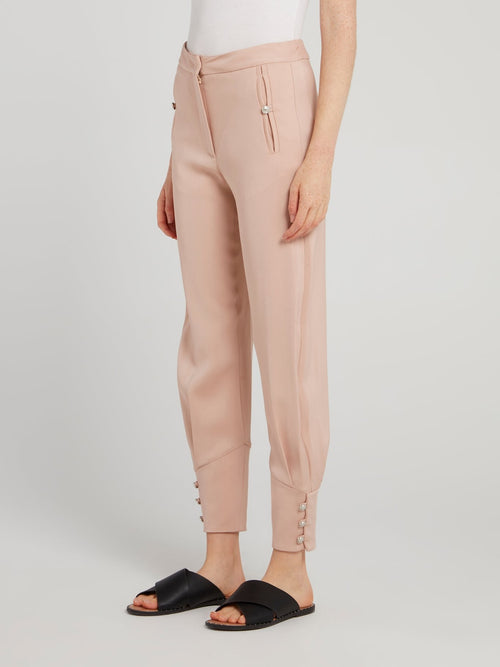 Бежевые зауженные брюки с манжетами