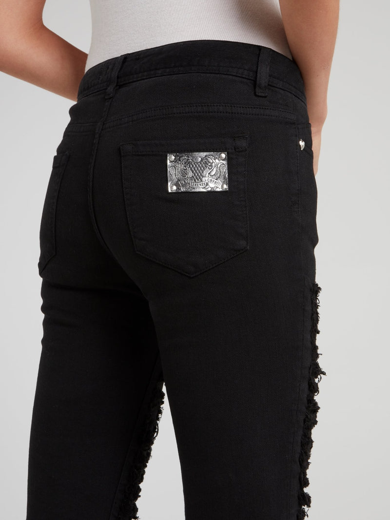 Черные брюки скинни с рваной отделкой