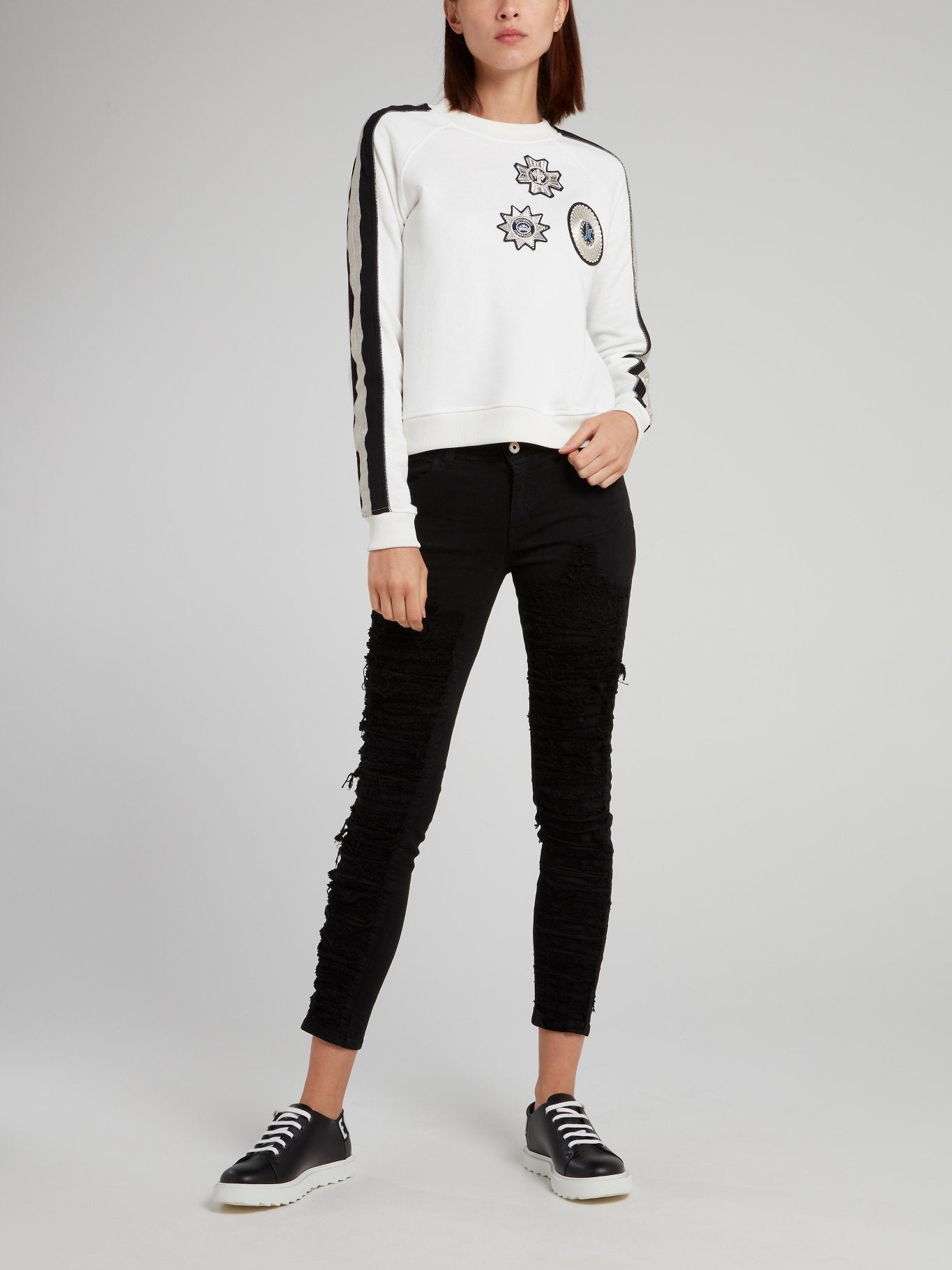 Черные брюки скинни с рваной отделкой