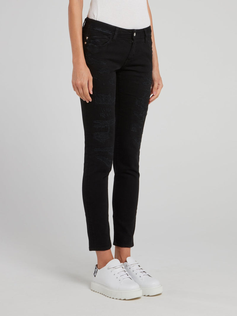 Черные укороченные джинсы с рваной отделкой