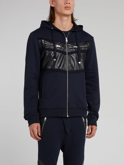 Темно-синяя спортивная куртка с кожаной вставкой