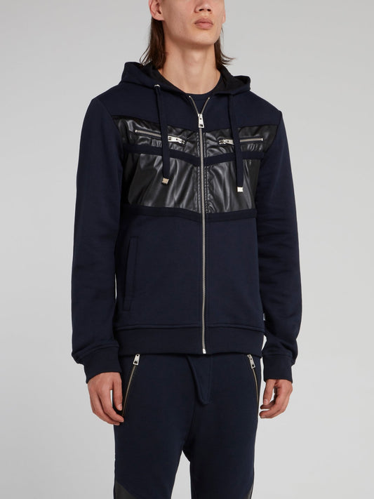 Темно-синяя спортивная куртка с кожаной вставкой