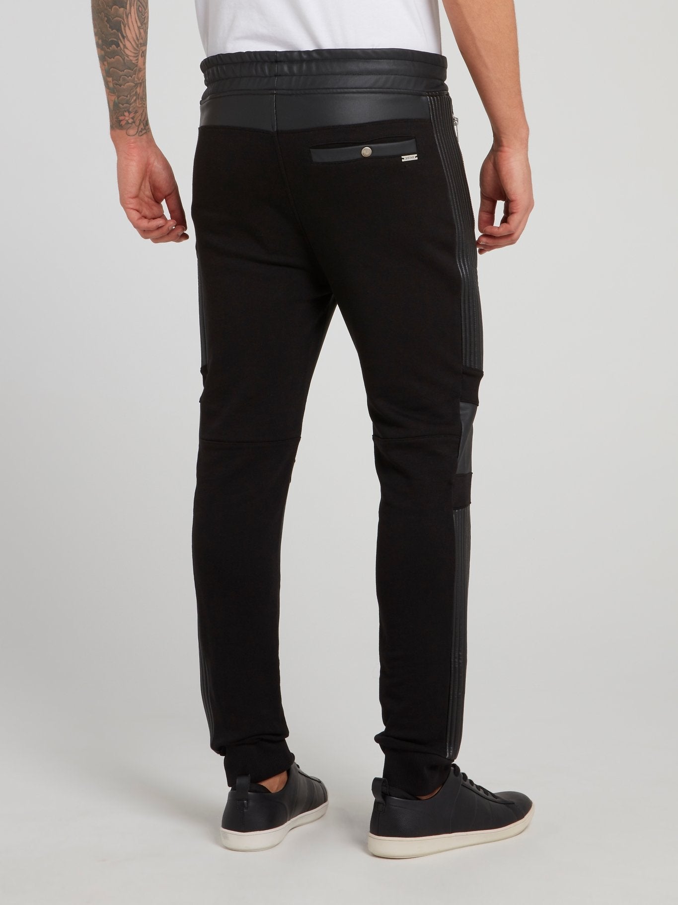 Черные кожаные брюки на шнуровке