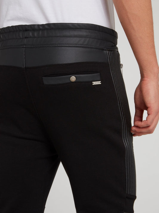 Черные кожаные брюки на шнуровке