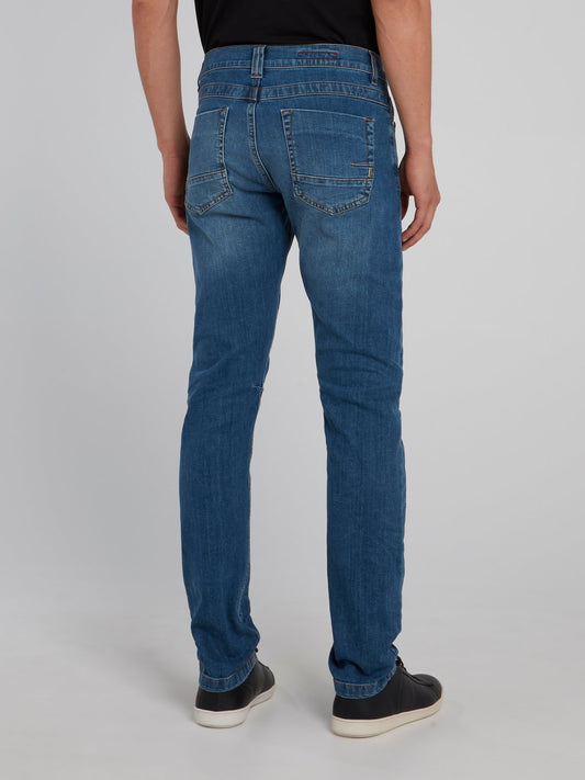 Темно-синие облегающие джинсы