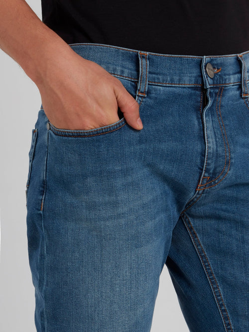 Темно-синие облегающие джинсы