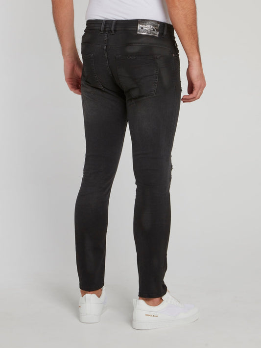 Черные джинсы стретч с рваной отделкой