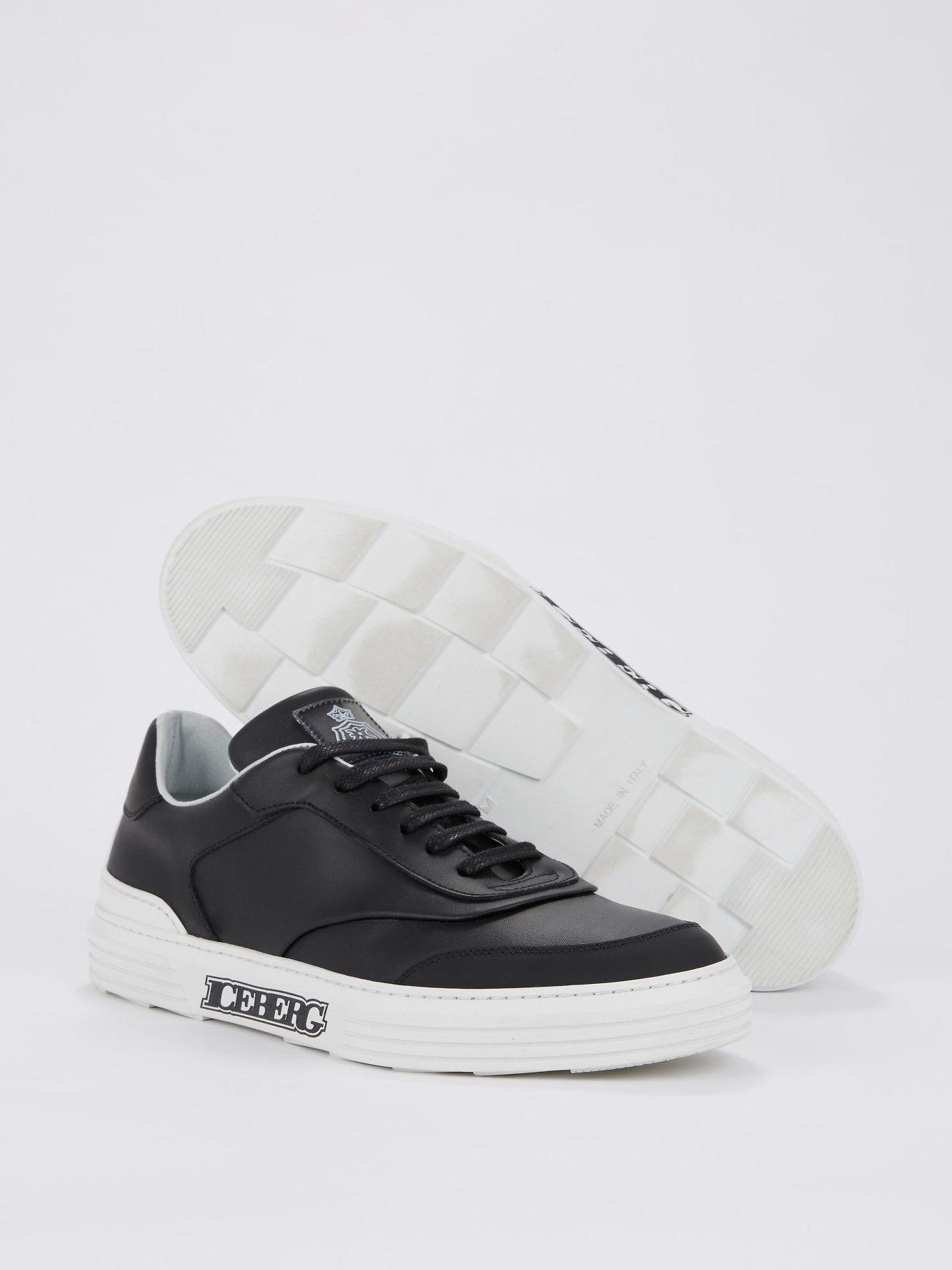 Черные низкие кожаные кроссовки