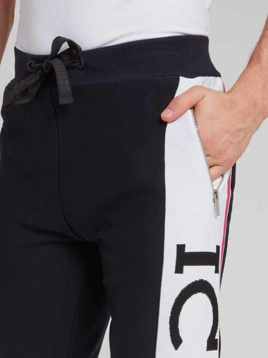 Темно-синие спортивные брюки из трикотажа с логотипом