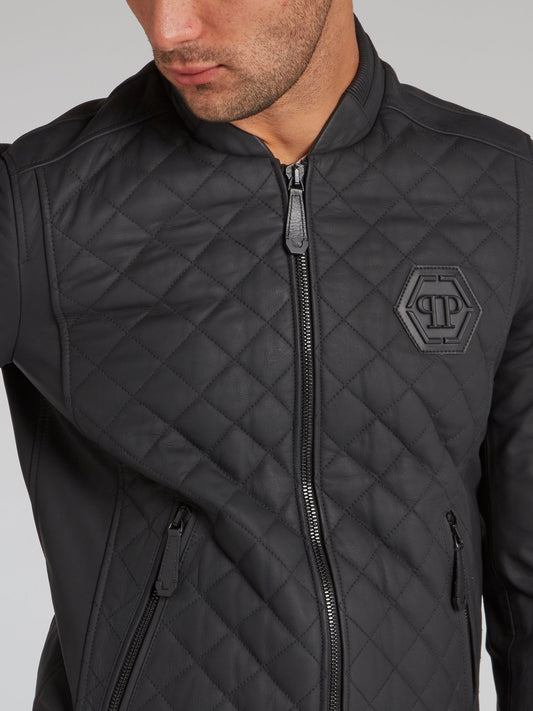 Черная стеганая куртка с изображением черепа и стразами