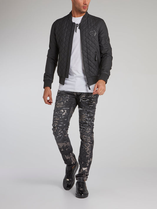 Черная стеганая куртка с изображением черепа и стразами