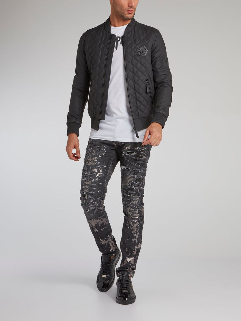 Черная стеганая куртка с изображением черепа и стразами