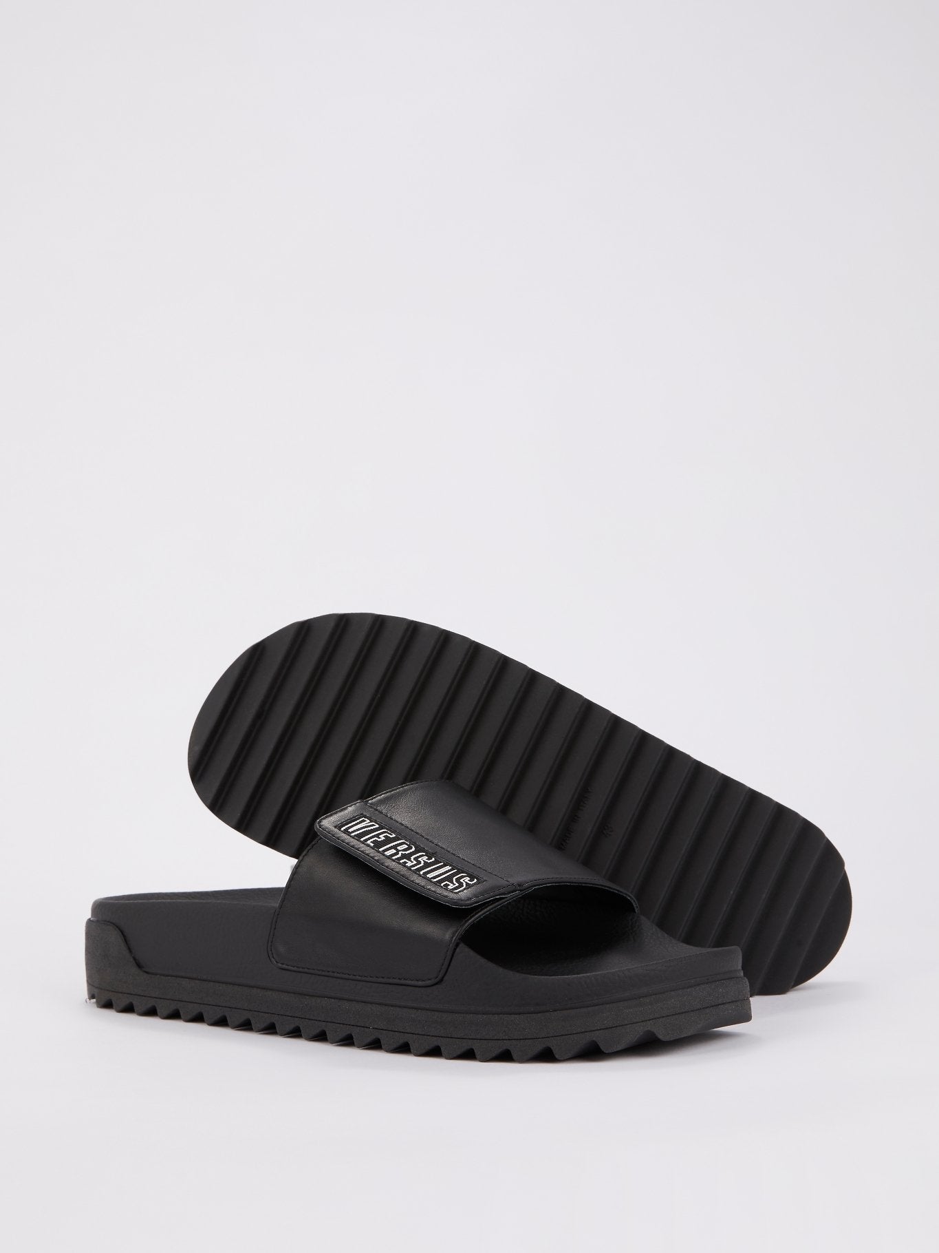 Черные шлепанцы с регулируемым ремешком Ciabattina