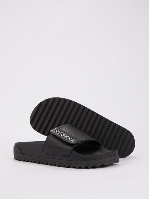 Черные шлепанцы с регулируемым ремешком Ciabattina