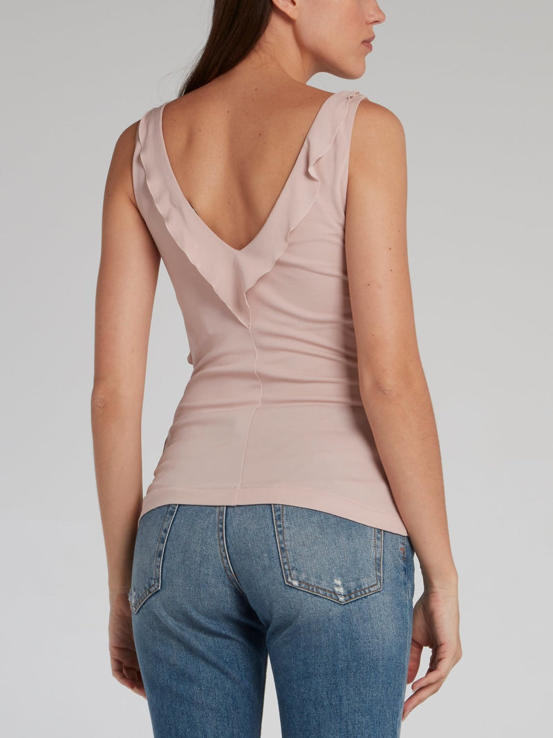 Бежевый топ с глубоким вырезом и кисточкой