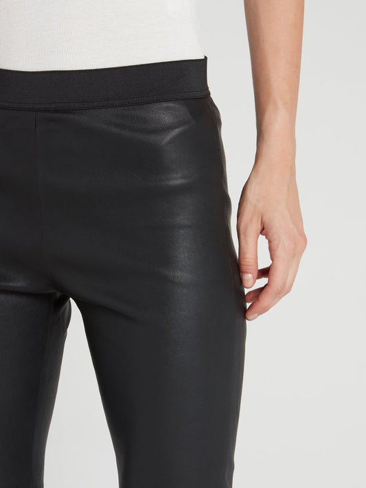 Черные кожаные брюки с эластичным поясом