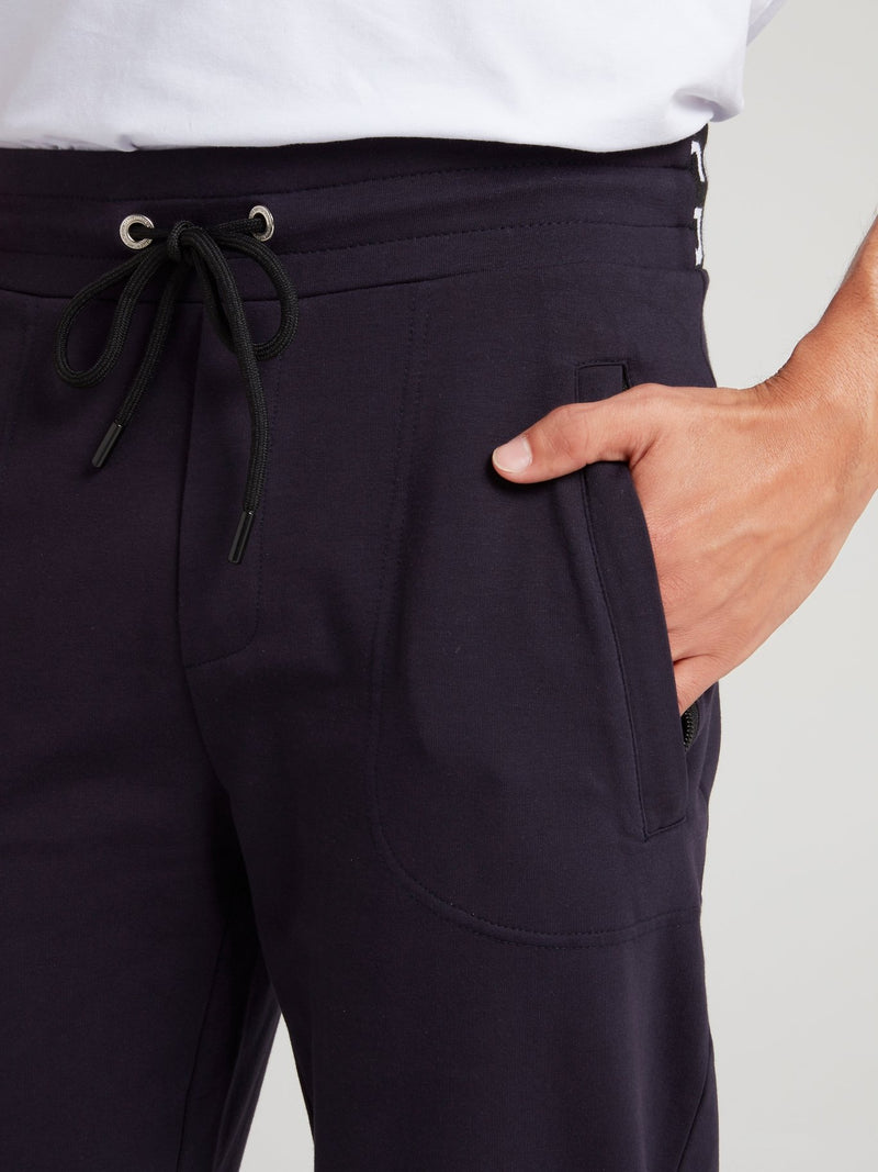Темно-синие брюки из флиса на резинке с логотипом
