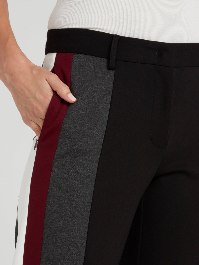 Черные широкие брюки с полосками