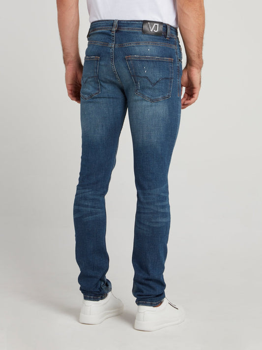 Синие джинсы скинни с рваной отделкой