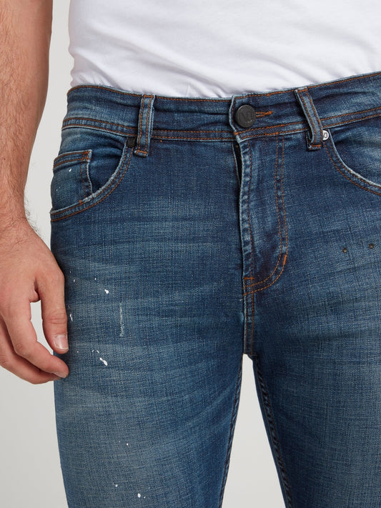 Синие джинсы скинни с рваной отделкой