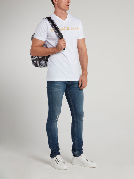 Синие джинсы скинни с рваной отделкой