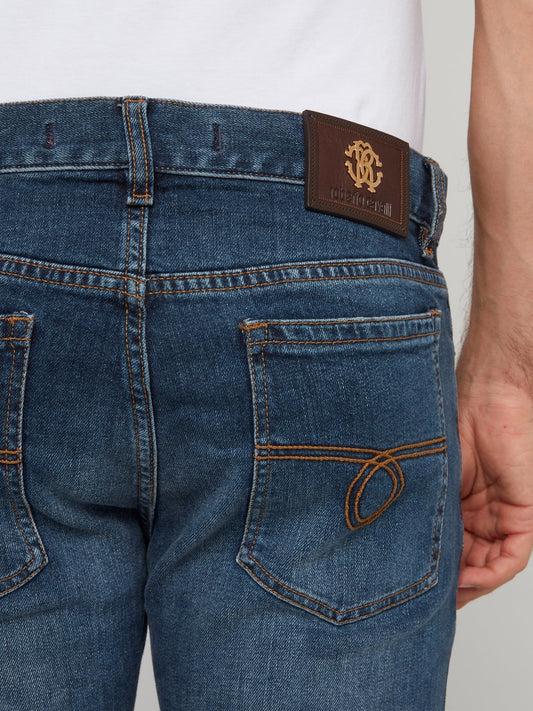 Синие джинсы с вышивкой