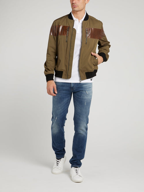 Синие джинсы с рваной отделкой