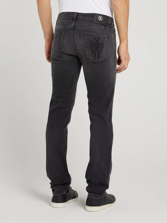 Черные джинсы с выцветшим эффектом