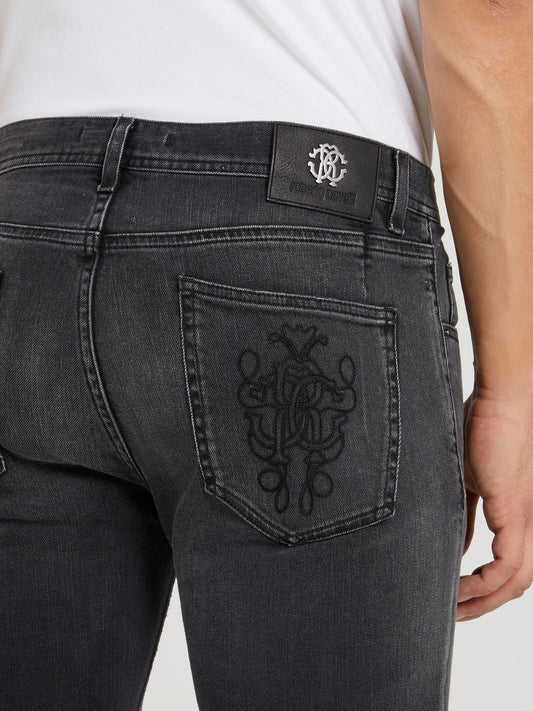 Черные джинсы с выцветшим эффектом