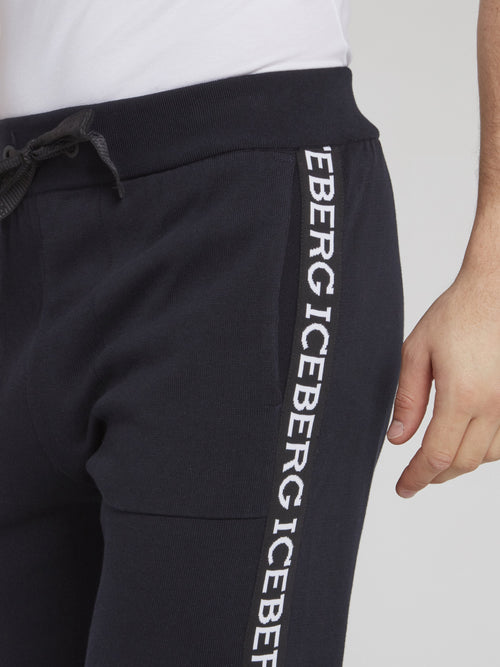 Темно-синие спортивные брюки из трикотажа с логотипом