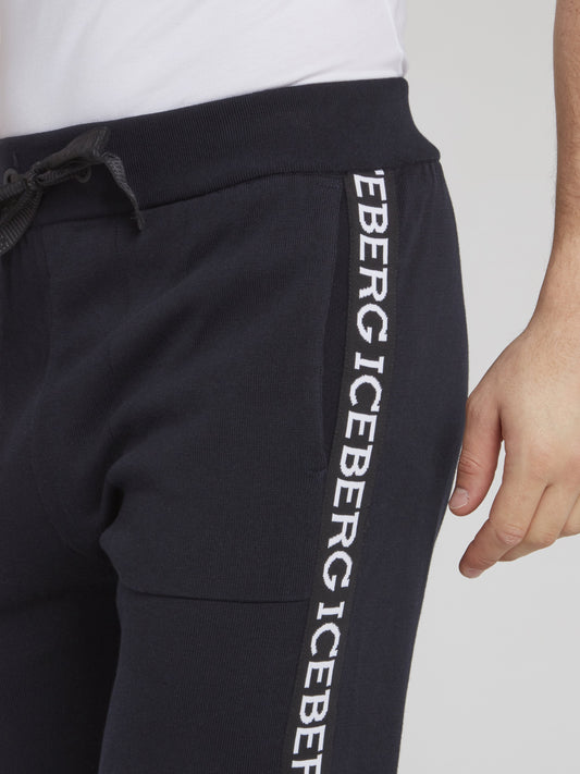 Темно-синие спортивные брюки из трикотажа с логотипом