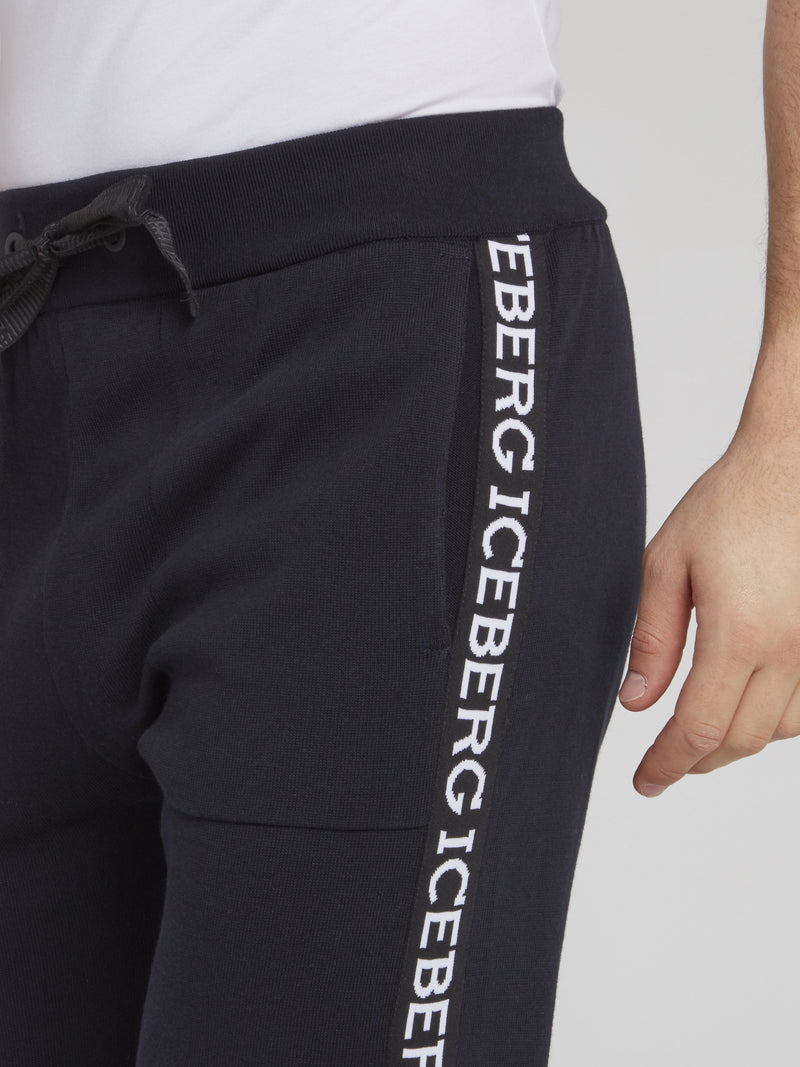 Темно-синие спортивные брюки из трикотажа с логотипом